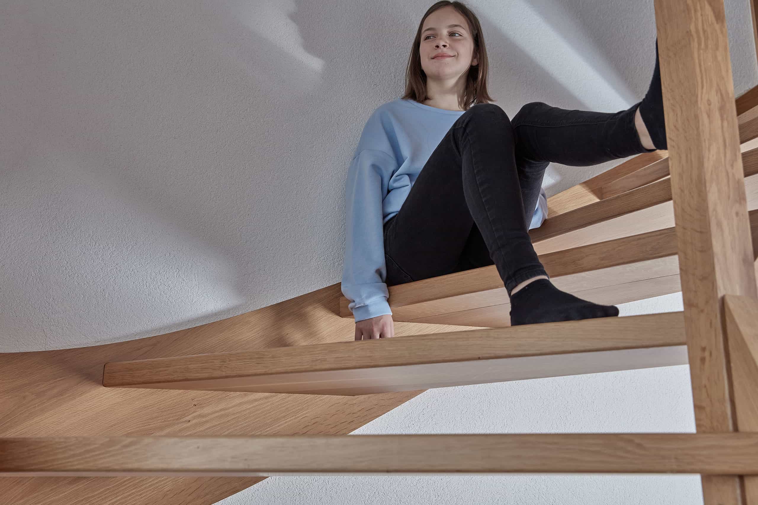 Wohlfink Holztreppe mit Kind